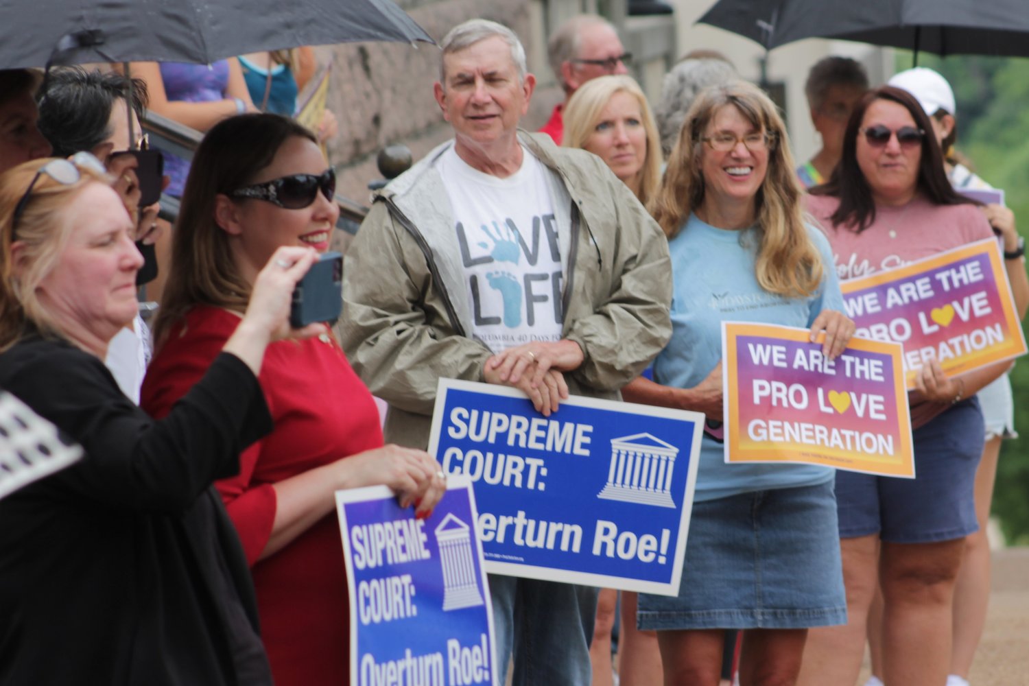 People gather outside the Missouri Supreme Court Building in Jefferson City in a Decision Day Rally on June 24, the day the U.S. Supreme Court overturned the 1973 decision that legalized abortion-on-demand throughout the country.